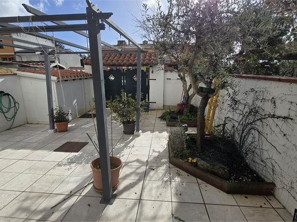 Funtana Buddia-Villetta a schiera con giardino